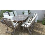 A good quality secondhand Alfresco eight seat reclining dining set with cushions - table 160 x