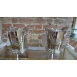 A pair of plated wine coolers with embossed decoration - Height 22cm x Width 27cm - as new