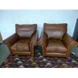 A pair of Laura Ashley brown leather armchairs - Height 90cm x Depth 100cm x Width 93m - good