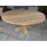 A Bramblecrest teak Kuta table - Diameter 145cm