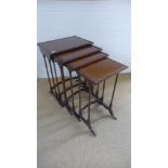 A nest of four Regency style mahogany side tables on ring turned supports and concave stretchers -