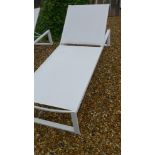 An ex display Life Outdoors designer sun loungers in white
