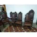 Eight Victorian carved oak Baronial dining chairs including two throne chairs with griffin carved