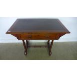 An Arts and Crafts mahogany writing table with two drawers - Height 73cm x 91cm x 55cm