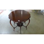 An Edwardian mahogany circular side table - clean restored condition - Height 69cm x Diameter 68cm