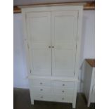 An off white painted wardrobe on chest in two parts - Height 204cm x Width 110cm x Depth 56cm