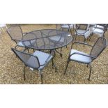 A Bramblecrest Atlantic mesh round table - Diameter 110cm with four chairs and cushions