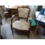 A walnut chair on carved cabriole legs - in good condition