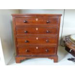 A 19th century mahogany apprentice four drawer chest of drawers on bracket feet - Height 25cm x