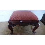 A 19th century mahogany stool on cabriole legs with a recently upholstered top