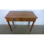 A Victorian mahogany two drawer writing table - Height 75cm x 91cm x 48cm