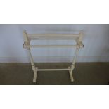 An Edwardian painted towel rail