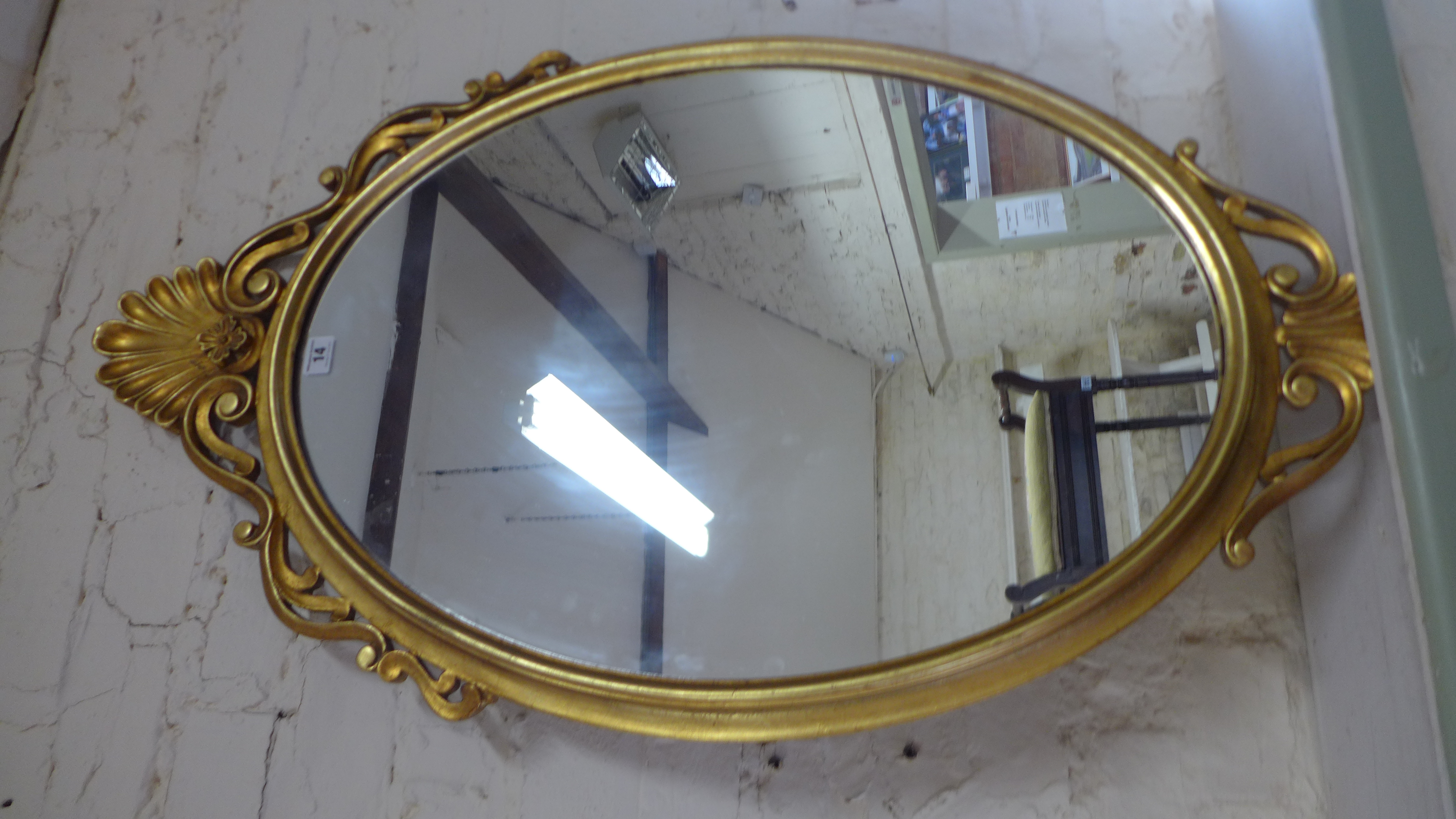 A modern gilt framed mirror - 95cm x 54cm