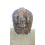 A carved head of an Indian chief - Height 47cm