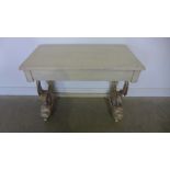 A painted 19th century consul table on twin carved dolphin supports - Height 75cm x 93cm x 49cm