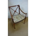 A Shereton Revival Edwardian mahogany armchair