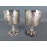A pair of silver bark effect goblets Sheffield 1976 maker SC 11cm tall approx weight 14 troy oz -