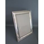 A silver photo frame Dublin 1998 CF Ltd - 22cm x 17cm - some usage marks,