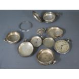 Assorted silver watch cases and parts,