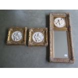 A modern gilt framed mirror with putti riding dolphins - 77cm x 32cm and two in gilt frames