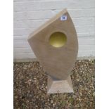 A limestone sculpture with a hardstone base - Height 73cm