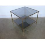 A 1960's French Brass side table with smoked glass shelves - Height 50cm x 60cm x 60cm