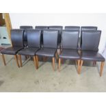 A set of ten modern dining chairs with chocolate leather finish raised on tapered supports by