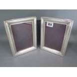 A modern silver double photograph frame to take 15cm x 10cm photographs - in good condition