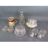 A collection of five silver top bottles,