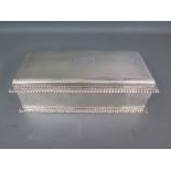 A good quality presentation silver desk box - London 1898/99 - maker IMS - Height 6cm x 21cm x 10cm