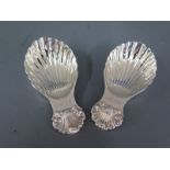 A pair of shell shaped silver caddy spoons Birmingham 1982 maker PHV and Co - approx weight 1.