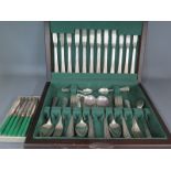 A boxed 44 piece silver plated canteen of cutlery by Oneida Silversmiths and a boxed set of silver