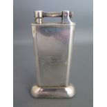 A Dunhill plated table lighter reg 737418 presentation engraving generally good