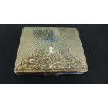 A Continental silver and gold ladies compact 8cm x 6cm - in good condition