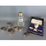 A silver egg cup and spoon boxed,