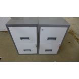 Two modern metal two drawer filing cabinets