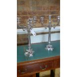 A pair of three light silver plated empire style candelabra