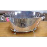 A large oval silver plated wine/champagne bath