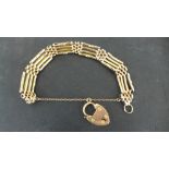 A 9ct yellow gold gate link bracelet - approx weight 14ct - one link missing,