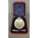 A boxed silver butter dish and knife Sheffield 1909 maker JR approx weight 1.