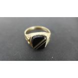 A 9ct yellow gold signet ring size U - approx weight 4 grams - good condition