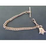 A 9ct rose gold Albert chain with a 9ct gold fireman's helmet charm engraved 1908 - Length 20cm -