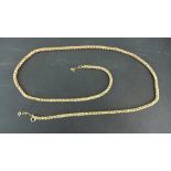 A French yellow gold neck chain presumed to be 18ct - Length 66cm - Approx weight 26 grams - in