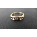 A 9ct yellow gold ruby and sapphire ring size O/P - total weight approx 2.