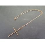 A 9ct gold crucifix and chain - chain length 48cm - approx weight 6.