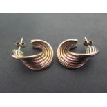 A pair of 9ct yellow, white and rose gold earrings approx weight 15.