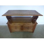 A 1930's carved light oak Monks bench with lift up seat - Width 107cm x Depth 52cm