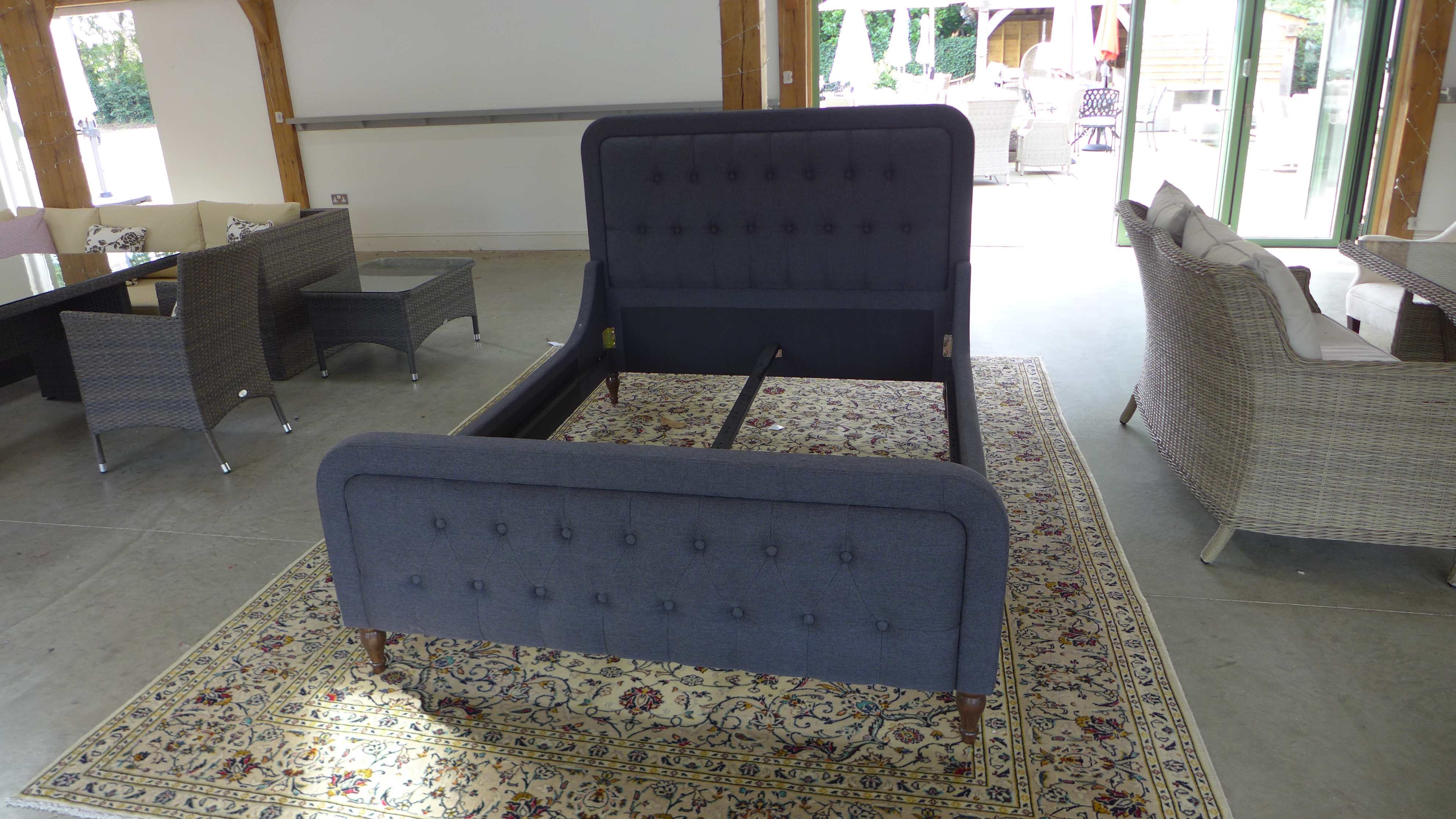 A new good quality upholstered 4ft 6in bed