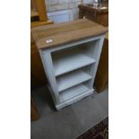 A painted small bookcase