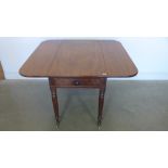 A good quality mahogany Pembroke table early 19th century, reeded legs,